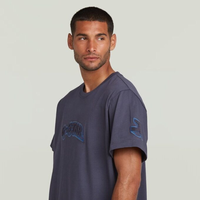 T-shirt med lappar och lös passform