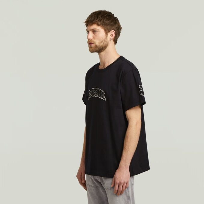 T-shirt med lappar och lös passform T-shirt med lappar och lös passform