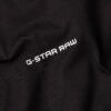T-shirt med logotyp i mitten av bröstet