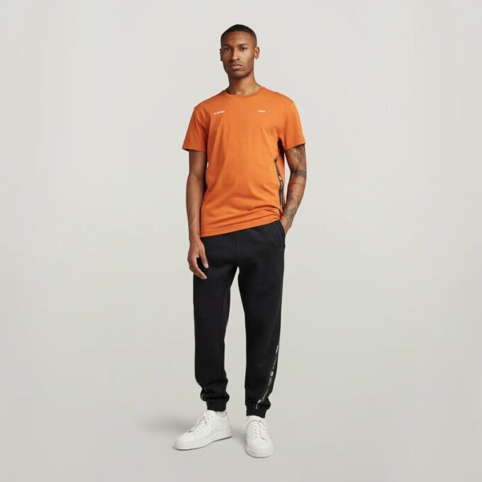 T-shirt med logotyptejp