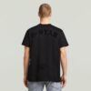 T-shirt med lös passform och flockmönster T-shirt med lös passform och flockmönster