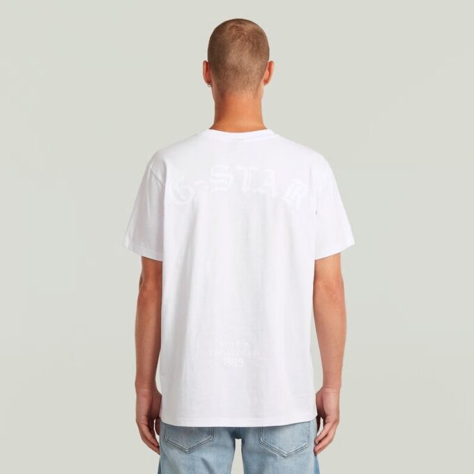 T-shirt med lös passform och flockmönster T-shirt med lös passform och flockmönster