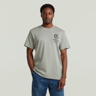 T-shirt med löst tryck och tryck på bröstet