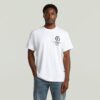 T-shirt med löst tryck och tryck på bröstet
