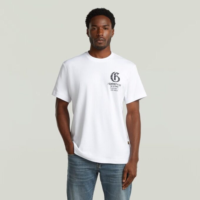 T-shirt med löst tryck och tryck på bröstet