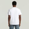 T-shirt med löst tryck och tryck på bröstet