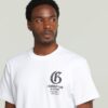 T-shirt med löst tryck och tryck på bröstet