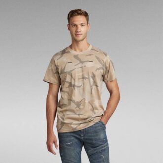 T-shirt med löstryck och kamouflagemönster