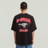 T-shirt med rutmönster och hundmotiv T-shirt med rutmönster och hundmotiv