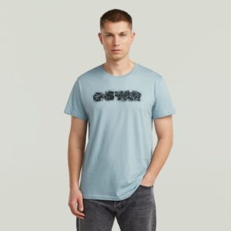 T-shirt med sliten logotyp och grafik