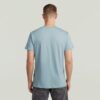 T-shirt med sliten logotyp och grafik T-shirt med sliten logotyp och grafik