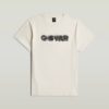 T-shirt med sliten logotyp och grafik
