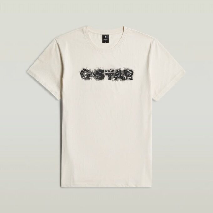 T-shirt med sliten logotyp och grafik