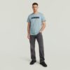 T-shirt med sliten logotyp och grafik T-shirt med sliten logotyp och grafik
