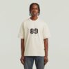 T-shirt med sprayad 89-rygg T-shirt med sprayad 89-rygg