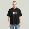 T-shirt med sprayad 89-rygg T-shirt med sprayad 89-rygg