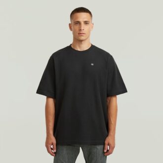 T-shirt med strukturerad logotyp på bröstet