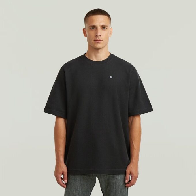 T-shirt med strukturerad logotyp på bröstet