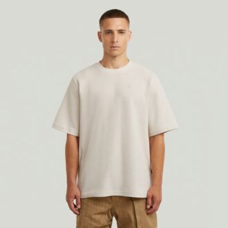T-shirt med strukturerad logotyp på bröstet