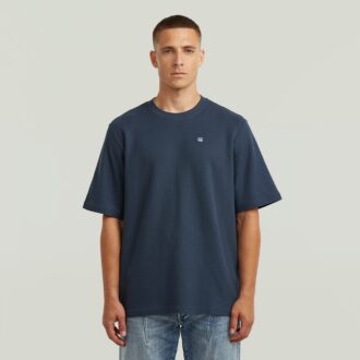 T-shirt med strukturerad logotyp på bröstet