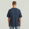 T-shirt med strukturerad logotyp på bröstet