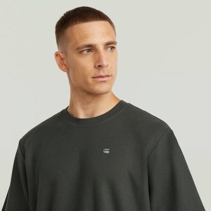 T-shirt med strukturerad logotyp på bröstet
