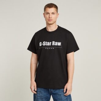 T-shirt med symboltryck och lös passform