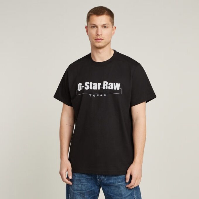 T-shirt med symboltryck och lös passform