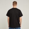 T-shirt med symboltryck och lös passform