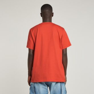 T-shirt med symboltryck och lös passform