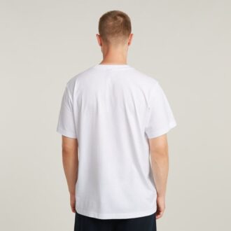 T-shirt med symboltryck och lös passform