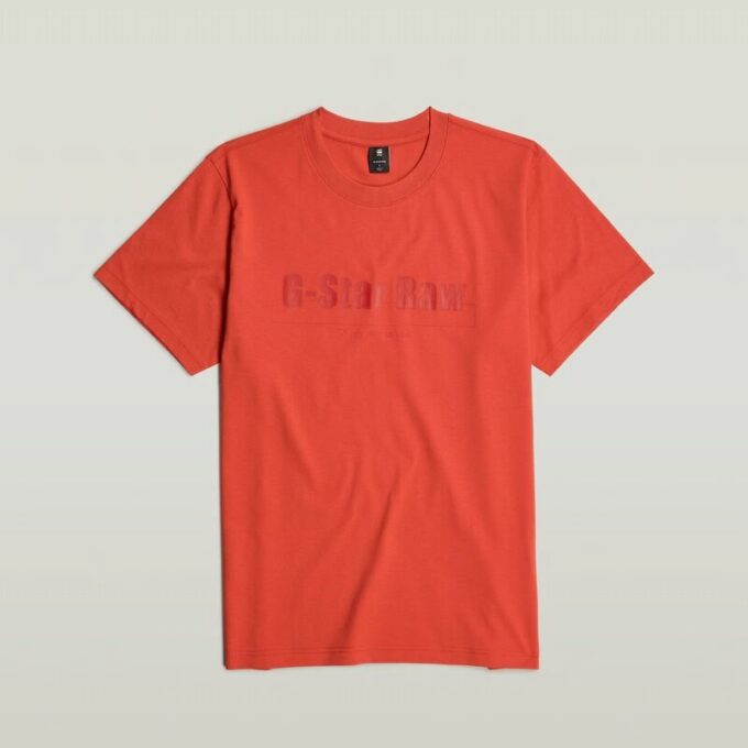 T-shirt med symboltryck och lös passform