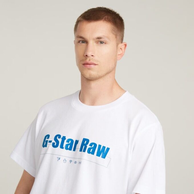 T-shirt med symboltryck och lös passform