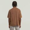 T-shirt med tvättad ficka