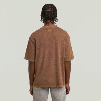T-shirt med tvättad ficka