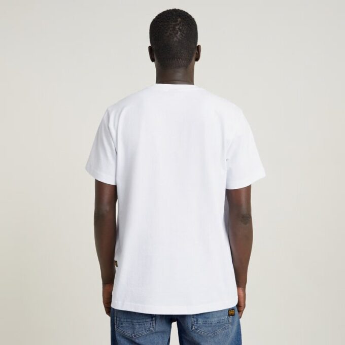 Unisex jeans-t-shirt med tecknad lös passform Unisex jeans-t-shirt med tecknad lös passform